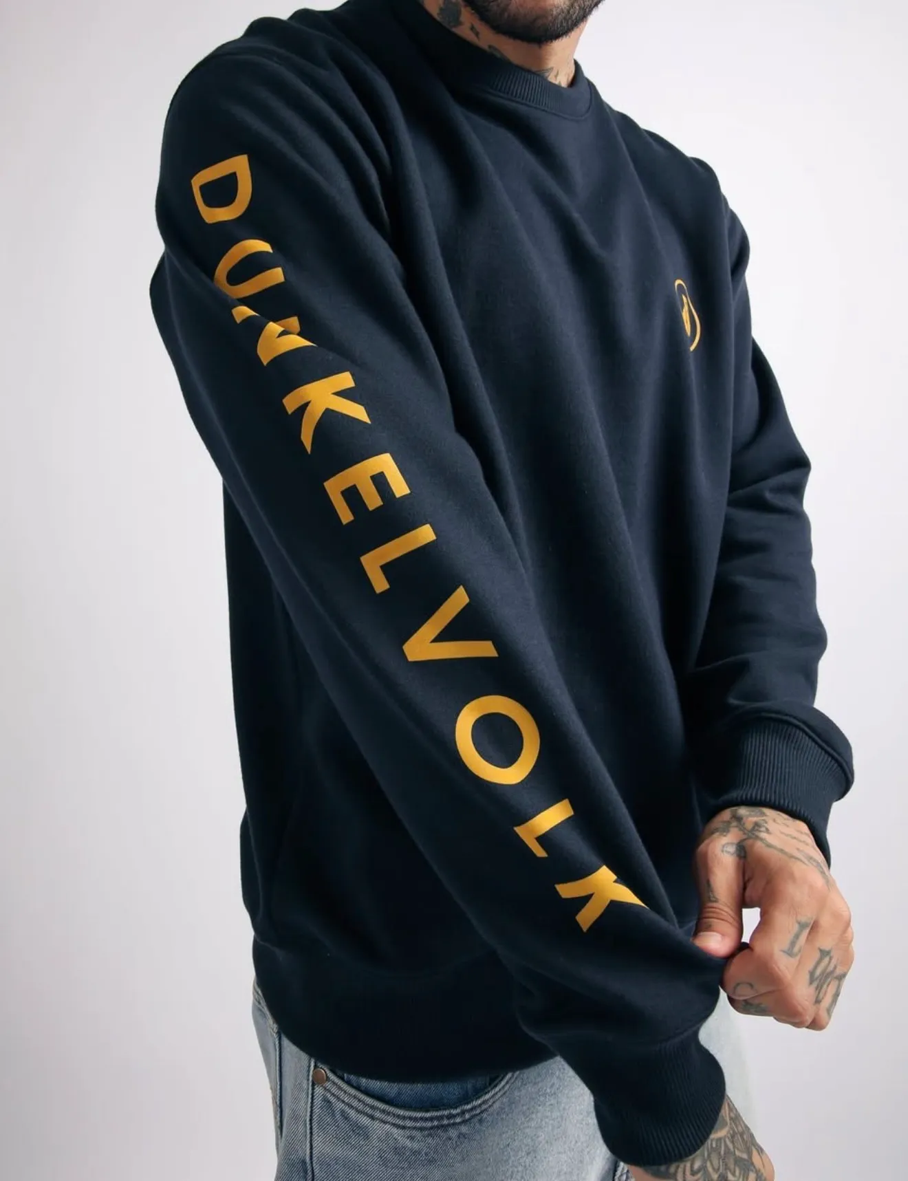 POLERA DUNKELVOLK NEW LOGO ARM CREWNECK